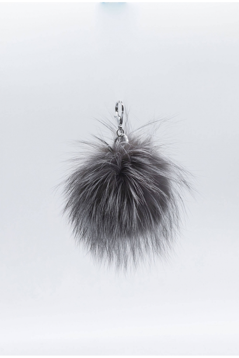PORTE CLES POMPON Gris chiné